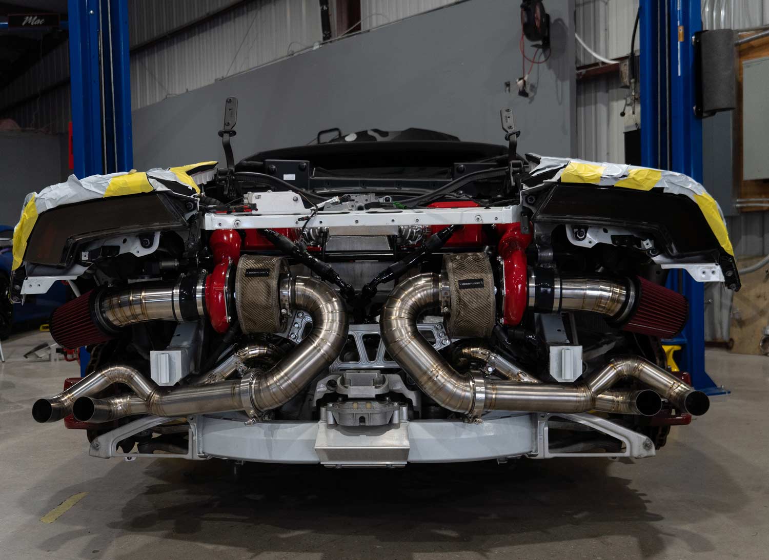Twin-turbo exhaust installation on a supercar